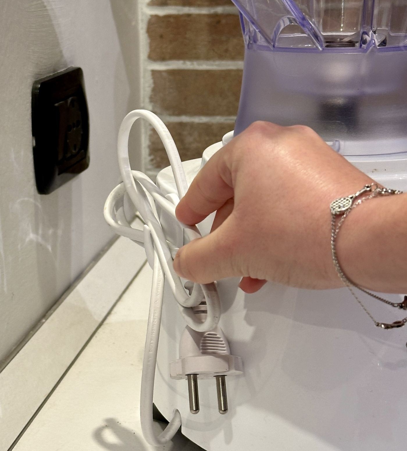 Wrap Appliance Cords Around A Command Hook