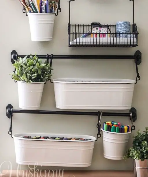 Tin Planters On A Rack Storage