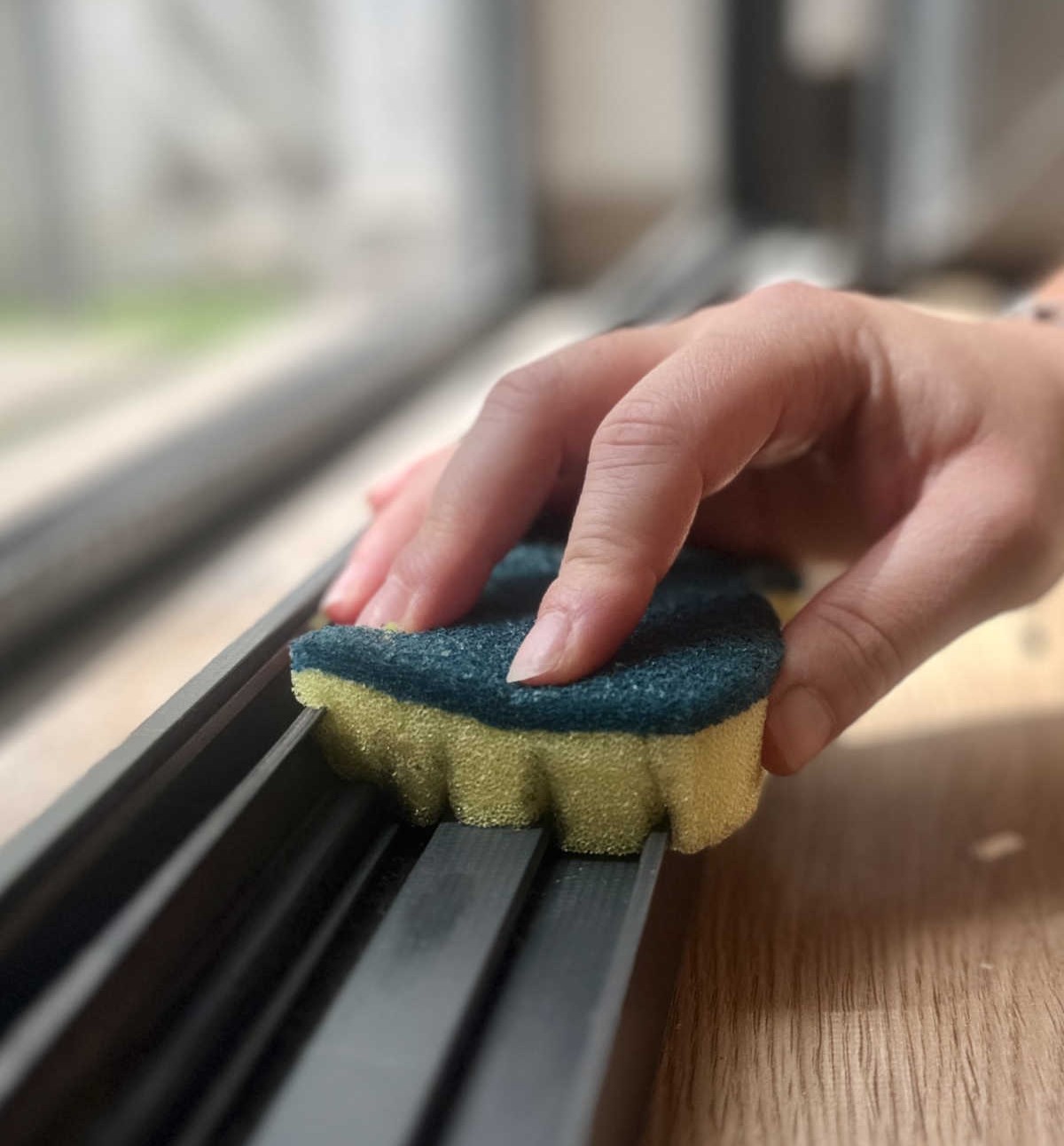 Cut a Sponge to Easier Clean the Window Guides