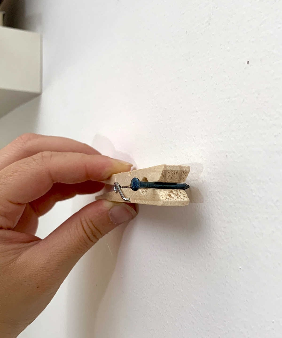 Use a Clothes Peg to Hold a Nail in Place