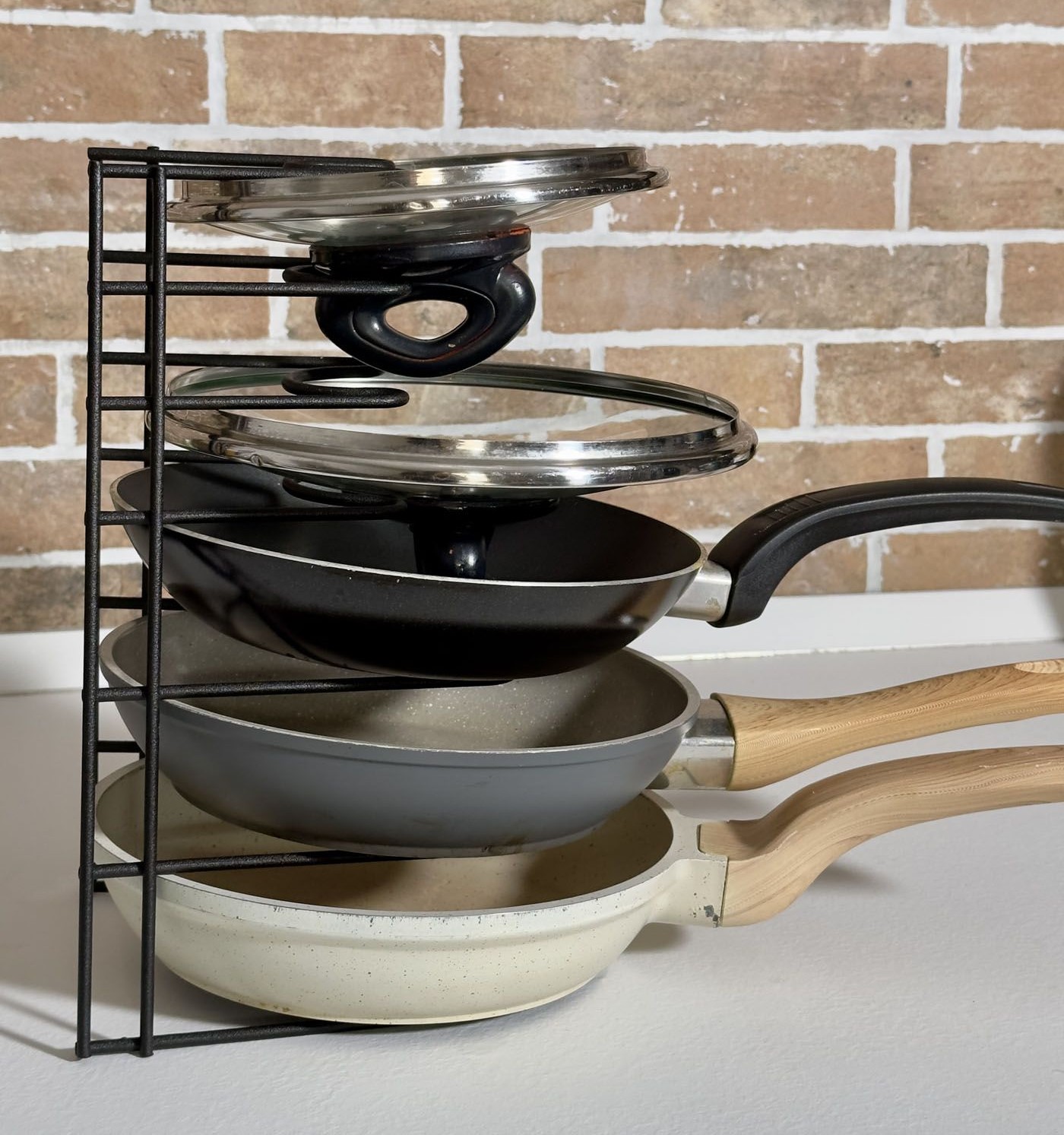 Use A Divider To Stack Pans And Lids