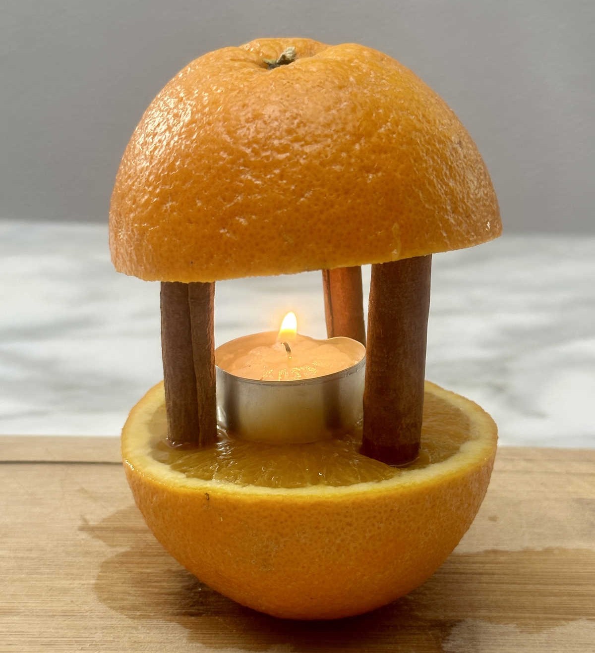 Make an Orange and Cinnamon Candle to Keep Insects Away